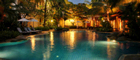 Romantically lit pool at Settha Palace Hotel